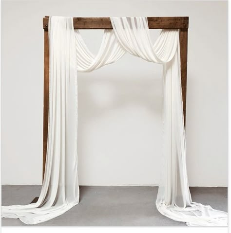 Minimal Wedding Arch Decor, Cloth Arch Wedding, Wedding Arbour With Fabric, Cheesecloth Draping Wedding, Wedding Arbor Draping, Wedding Arch Draping Ideas, Wedding Arch Cloth Draping, Ceremony Arch Draping, Wooden Wedding Arch With Drape