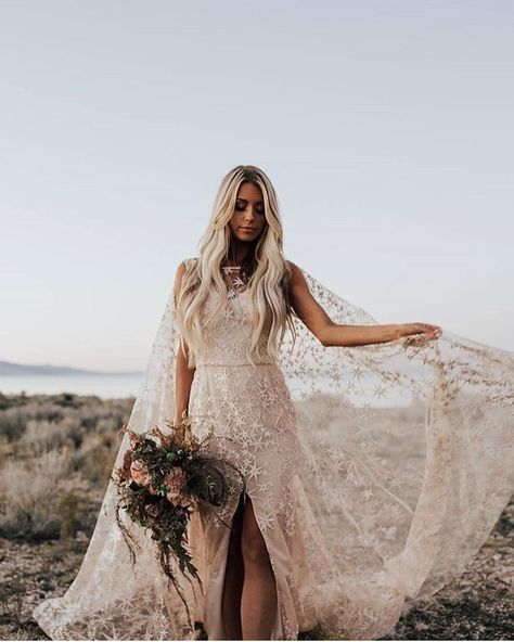 This impressive star gown is handmade in Portugal. You don’t have to be having a celestial themed wedding to embrace the beautiful ethereal pattern on this romantic, boho reception dress. For more wedding reception dress, from white to short to sequin to colourful - see Hitched's roundup! Wedding Dress With Split, Watteau Train, Gown With Cape, Western Wedding Dresses, Dress With Split, Wedding Reception Dress, Mini Robes, A Wedding Dress, Reception Dress