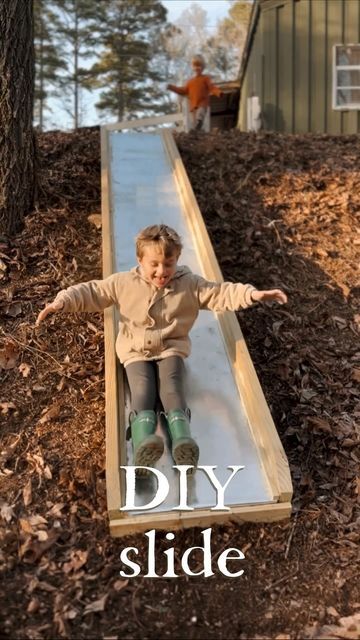 Taylor Moran on Instagram: "Nick made this out of wood and metal flashing. Apparently it’s NOT done and he wants to paint the wood a dark green to blend into the playground a little more 🥰 But how cool is this! I’d never seen a DIY slide before this!" Diy Slide Playground, Diy Indoor Slide, Diy Outdoor Slide, Diy Playground Ideas, Homemade Playground, Homemade Slide, Diy Slide, Wood Playground, Wooden Slide