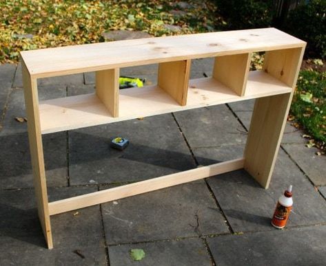 A DIY tutorial to build a desk storage hutch. Free plans to add compartment style cubbies above a desk for more organization. Build A Desk, Bike Storage Home, Desk Organizer Shelf, Building Shelves, Storage Hutch, Cube Storage Shelves, Storage Room Organization, Furniture Building, Craft Desk