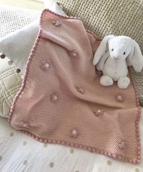 Crochet a fabulous floral baby blanket | LoveCrafts Pink Baby Crochet Blanket, Crochet Blanket With Flowers, Simple Knit Baby Blanket, Pink And White Crochet Blanket, Crochet Animal Baby Blanket, Flower Baby Blanket Crochet, Crochet Blanket Flower, Simple Crochet Baby Blanket, Flower Crochet Blanket