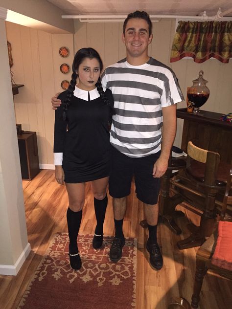 Pugsley and Wednesday Addams DIY Halloween Costume Wednesday Addams And Pugsley Costume, Wednesdays Costumes, Pugsly And Wednesday Costume, Adams Family Wednesday Costume, Pugsly Addams Costume, Wednesday Addams Couple Costume, Pugsley Costume, Wednesday Addams And Pugsley, Wednesday Adams Couple Costume