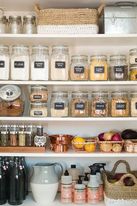 3 secret weapons and ideas for pretty kitchen pantry organization. This beautifully organized pantry is so inspiring! Whether you have an entire pantry or just a kitchen cabinet, these photos highlight three secret weapons that are a total must when it comes to keeping your ingredients — and other stuff — organized. Here's some food (storage) for thought. Organized Pantry, Kitchen Organisation, Clutter Free Home, Shared Kitchen, Home Organisation, Organizing Ideas, Pantry Organization, Kitchen Pantry, Diy Kitchen