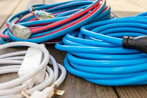 The Best and Worst Ways to Store Extension Cords: Reviews by Wirecutter | A New York Times Company Store Extension Cords, Garage Extension, Outdoor Extension Cord, Interior Minimal, Sign Board Design, Extension Cords, Cord Storage, Be Dangerous, Shop Window Design