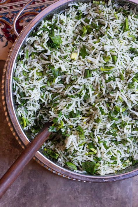 Sabzi Polo is a delicious Persian herb rice that's served with fish for Persian new year. Rice mixed with a selection of aromatic herbs makes this a great side dish to serve when you're feeding a crowd! #Persianfood #ricerecipes #easyricerecipes Persian Herb Rice, Jeweled Persian Rice Pilaf, Persian Rice Dishes, Persian Dishes Iranian Food, Easy Persian Recipes, Persian Dill Rice Recipe, Persian Meals, Dill Rice Recipe, Sides For Fish