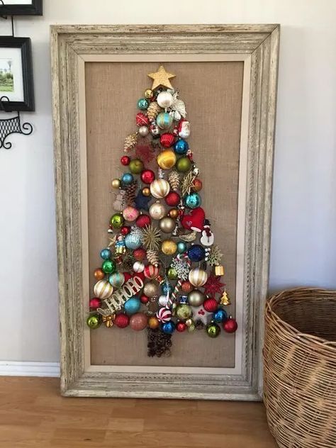 a Christmas tree wall art of bright vintage Christmas ornaments is a super cool and bold idea to repeat Framed Ornaments Diy, Craft With Picture Frames, Christmas Tree In A Frame, Ornament Frame Diy, Christmas Tree Crafts For Adults, Old Time Christmas Decorations, Christmas Tree Frame, Christmas Frames Diy, Christmas Ornament Frame