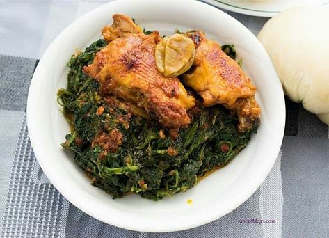 Kati Kati, grilled chicken sauteed with spices, is a distinctive dish of the Nkom people in northwest Cameroon. It is often served with fufu, a staple West African starch made by mixing and pounding cassava and/or green plantain flour thoroughly with water, and njama njama (stir-fried huckle berry leaves). 📷:@kesfoodie_goodies #esclore #food Plantain Flour, West African Food, African Recipes, Sauteed Chicken, African Food, Japchae, Grilled Chicken, Stir Fry, Food Dishes