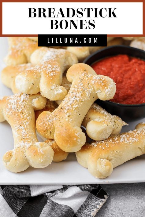 Serve these soft and cheesy breadstick bones up with a side of marinara for a delightfully spooky snack or appetizer! #breadsticks #halloween #halloweenappetizer #halloweenside Breadstick Bones, Savory Rolls, Pretzel Dogs, Pumpkin Banana Bread, Cheesy Breadsticks, Ravioli Bake, Spooky Snacks, Mini Pretzels, Pumpkin Banana