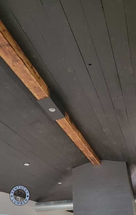 Shiplap ceiling painted charcoal black in a pole barn style new home build. Black Ceiling With Wood Beams, Black Shiplap Ceiling, Black Wood Ceiling, Ceiling Inspiration, Ceiling Painted, New Home Build, Wood Plank Ceiling, Shiplap Wood, Shiplap Boards