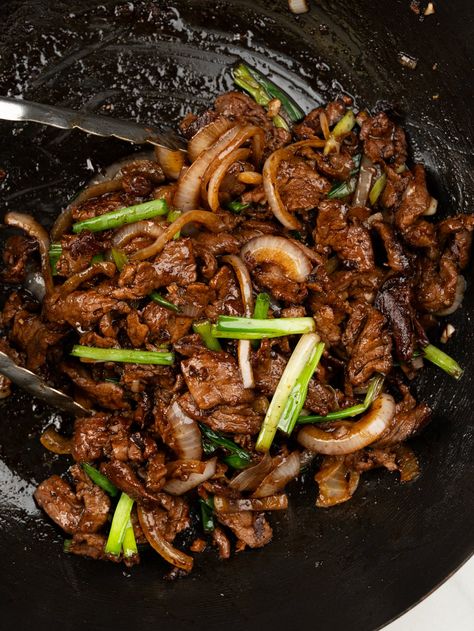 This steak stir-fry comes together in 15 minutes to give you a delicious and satisfying weeknight dinner. Tenderizing the meat gives you the most tender beef ever. Jalapeno Beef Stir Fry, Think Steak Recipes Dinners, Shaved Steak Stir Fry, Steak Stir Fry Recipes Easy, Beef Asparagus Stir Fry, Stir Fry Recipes Beef, Shaved Beef Steak Recipes, Steak Stir Fry Recipes, Sliced Steak Recipes