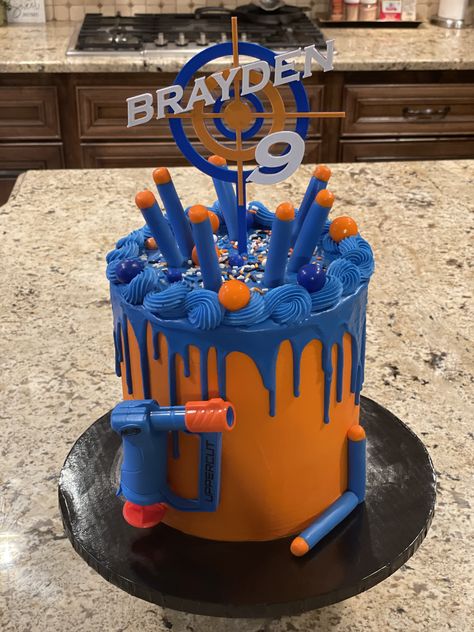 Birthday Ideas For 6 Year Boy, 8th Birthday Boy Party Theme, Nerf Cakes For Boys, Nerf Birthday Cake, Nerf Birthday Party Ideas, Nerf Cake, 6th Birthday Boys, Nerf Birthday Party, Birthday Care Packages