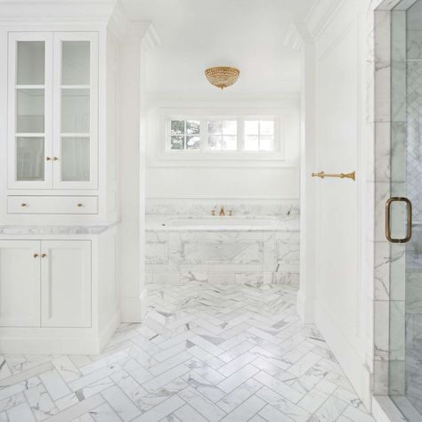 Calacatta marble tile and tub surround in a luxurious white classic bathroom. #thefoxgroup #bathroomdesign #calacattamarble Bathroom Calacatta, Bathroom Classic Design, The Fox Group, Fox Group, Coastal Style Furniture, Marble Tub, Tub Surround, Calacatta Marble, Classic Bathroom