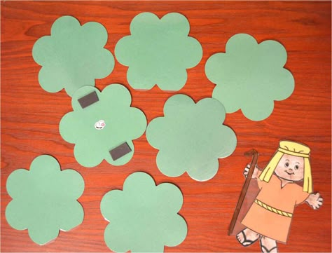 In this game, the children have to see if they can find the one lost sheep.  I made several bushes (more than pictured here) and put magnets on the back of each one so I could use this game on our large magnetic whiteboard.  A cookie sheet could be used just as well.  I put a sticker of a sheep on the back of only one of the bushes.  The children take turns turning over a bush until someone finally finds the one lost sheep. Vbs Activities, Sunday School Games, Preschool Bible Lessons, Parables Of Jesus, Children's Church Crafts, Sheep Crafts, The Lost Sheep, Lost Sheep, Preschool Bible