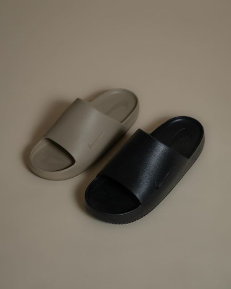 Nike Calm Slides available now at both locations & online via Solefly.com $50 USD. Available in multiple colorways. Slides, Nike, Sneakers, Quick Saves