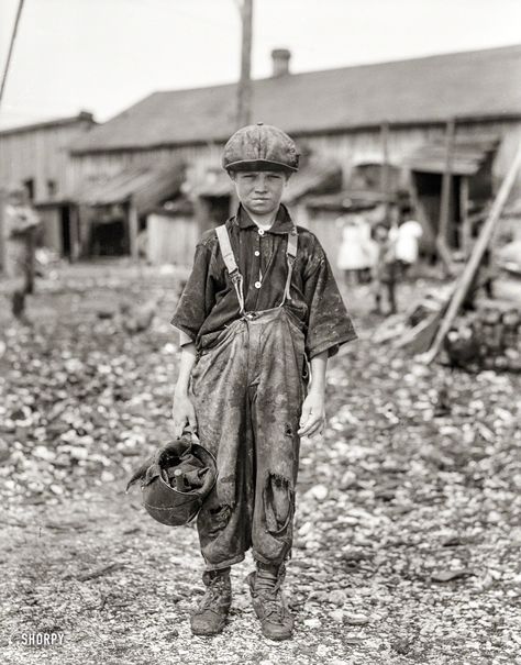 Raggedy Henry: February 1912. "Henry, 10-year-old oyster shucker who does five pots of oysters a day. Works before school, after school, and Saturdays. Been working three years. Maggioni Canning Co., Port Royal, South Carolina." Glass negative by Lewis Wickes Hine Oyster Shucker, Before School, Port Royal, After School, South Carolina, Labor, Baseball, Canning