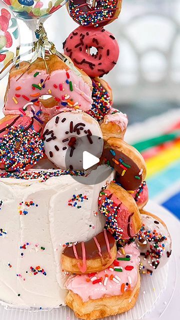 Ashley Klaja on Instagram: "It’s NATIONAL DONUT DAY!!! Here’s your sign to go out and get all the donuts you want because the calories won’t count today 😉 This is a cake I made with actual donuts in the middle. Perfect for all the donut lovers! #nationaldonutday #donutcake #sprinkledonut #donut #donutday" Donut Platter, Donut Hole Cake, Donut Day, National Donut Day, Sprinkle Donut, Donut Holes, Cake Donuts, Go Out, Donuts