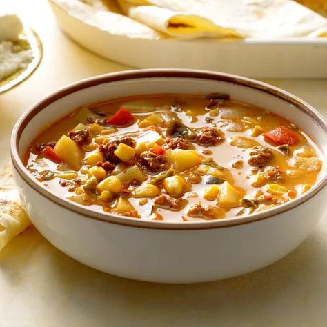 Mexican Chorizo and Corn Soup Recipe: How to Make It Chorizo Soup Slow Cooker, Mexican Chorizo Soup, Soup With Chorizo Sausage, Chorizo Potato Soup, Mexican Corn Chowder Recipe, Recipes Using Chorizo, Corn Chowder Crockpot, Chorizo Soup Recipes, Chorizo Soup