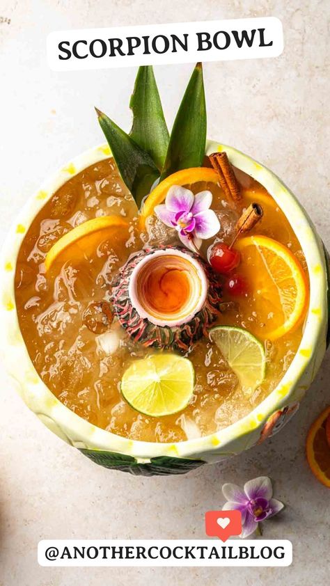 The scorpion drink is a high-proof tiki punch is traditionally served in a large, tiki-themed bowl with multiple straws for sharing with friends. It’s sweetened with fruit juices and cocktail syrups, which balance the scorpion cocktail’s potent spirits for tropical and refreshing treat. Scorpion Bowl Recipe Drinks, Scorpion Cocktail, Scorpion Bowl Recipe, Tiki Food, Tiki Punch, Fishbowl Cocktail, Event Drinks, Scorpion Bowl, Fishbowl Drink