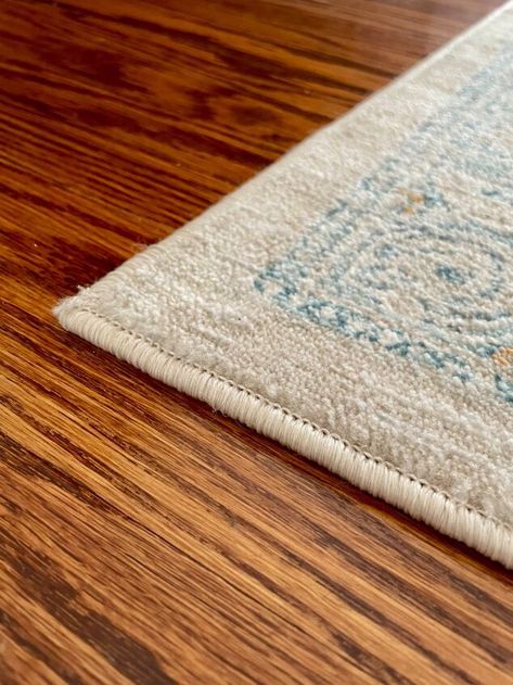 I'm sure at one point or another we have all experienced the frustration that comes along with curled up carpet corners. Not only do they pose a safety hazard with regard to tripping, they also look unsightly.I have tried so many “hacks” to try to get this one corner on my area rug to stay down, and while they work for a brief amount of time, the corner always seems to lift its way back up.Upon doing some research on how to get this rug to lay flat, I came across a product that you sti… Drop Cloth Rug, Hacks To Try, Light Up Canvas, Getting Rid Of Mice, Clean Kitchen Cabinets, Stay Down, Cheap Carpet, Carpet Padding, Floor Ceiling