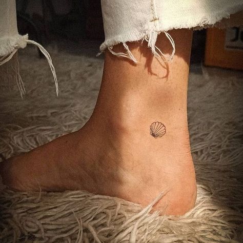 Little Seashell Tattoo, Small Shell Tattoos For Women, Wave And Shell Tattoo, Shells Tattoo Ideas, Shell Tattoo Behind Ear, Sand Dollar Tattoo Fine Line, Dainty Seashell Tattoo, Shell Ankle Tattoo, Camino Shell Tattoo