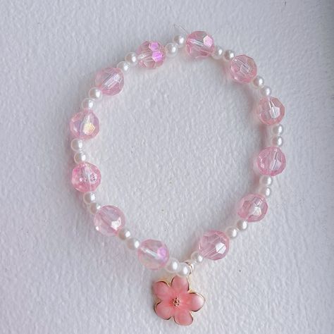 pink flower charm bracelet ❀ looking for a gift for yourself or a friend? check out our etsy in bio! 💕 #etsy #bracelet #handmade #cute #pink #flower #charm #giftideas Flower Charm Bracelet, Gift For Yourself, Bracelet Handmade, Flower Charm, Pink Flower, Cute Pink, Pink Flowers, Charm Bracelet, Bracelet