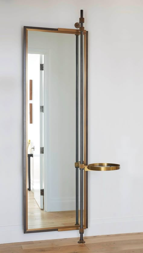 This full height mirror is housed in an oxidized oak frame with a warm brass decorative bezel. The round, swing arm tray, has an oxidized oak base with a solid brass surround and visible hardware. The Loft system's blackened steel support post runs Loft Mirror, Long Mirror, Big Wall Art, Nate Berkus, Dressing Mirror, Brass Decor, Large Mirror, Bathroom Wall Decor, A Mirror