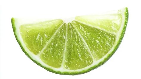 ↑↑↑ Larger size on website 🔸 A lime wedge, sliced in half, is shown against a white background.  The wedge is green and juicy, wi Shiny Texture, Lime Wedge, A White Background, White Background, Wedges, Texture, Green, White