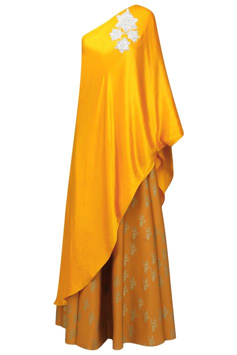 Mustard yellow one shoulder cape and floral skirt set available only at Pernia's Pop Up Shop. One Shoulder Cape, Cape Dresses, Cape Top, Shoulder Cape, Indian Designer Suits, Drape Dress, Fashionista Clothes, Indian Wedding Outfits, Lehenga Designs