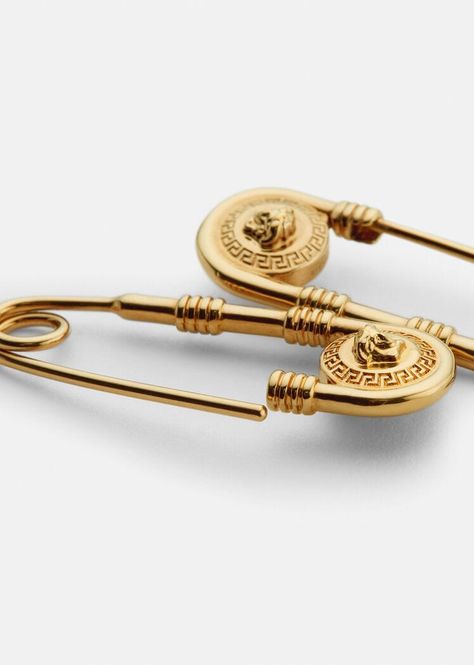 An iconic representation of brand DNA, these drop earrings feature the Safety Pin in Versace Gold finish. All Versace jewelry items are lead and nickel free. All materials are hypoallergenic. Versace Earrings, Ancient Coin Jewelry, Versace Jewelry, Pin Earrings, Versace Gold, Safety Pin Earrings, Luxury Jewelry Brands, Earrings In Gold, Coin Jewelry