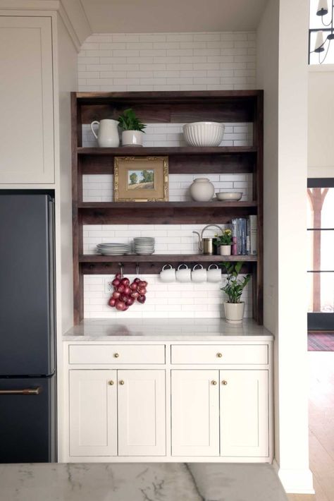 Cabinets and walnut shelving next to a refrigerator. Kitchen Cabinet And Shelf Combo, Ge Cafe Range, Walnut Shelving, Shelving In Kitchen, Cookbook Display, Kitchen Built In, Homestead Kitchen, Scratch Cooking, Used Cabinets