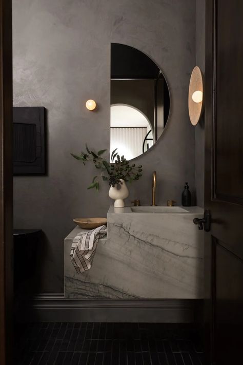 21 Modern Bathroom Ideas That Will Convince You to Go Sleek | Architectural Digest Contemporary Primary Bathroom, Black Bathroom Vanity Mirror, Modern Spa Bathroom Design, Sleek Bathroom Ideas, Moody Organic Modern Bathroom, Modern Sleek Bathroom, Contemporary Powder Room Design, Powder Room Without Window, Serene Bathroom Ideas