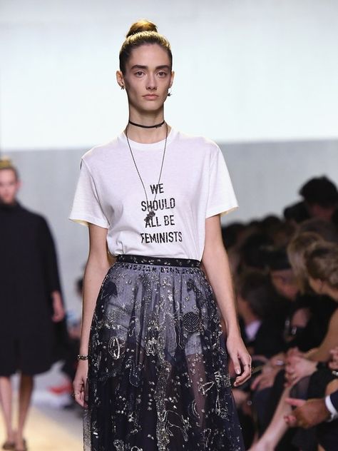 Political fashion tees are everywhere this season, but the sartorial movement started back in September with Dior. For her spring 2017 debut as the fashion house's creative director, Maria Grazia Chiuri presented a "We Should All Be Feminists" T-shirt inspired by Chimamanda Ngozi Adichie's 2014 essay of the same name. We Should All Be Feminists, Clara Lionel Foundation, American Men, German Fashion, Maria Grazia, London Street Style, Latest News Headlines, News Website, Fashion Line