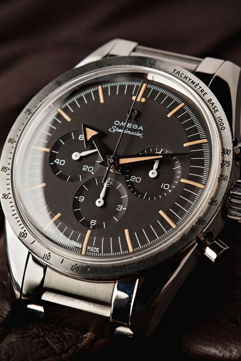 A tribute to an icon. With its signature broad arrow hand and tachymeter scale, the Speedmaster ’57 pays homage to the release that started it all. This piece houses Omega’s manual winding cal. 1861 inside its 38.6mm case. Omega Speedmaster 57, Speedmaster 57, Omega Watches, Time Machine, Omega Speedmaster, Omega Watch, Pins