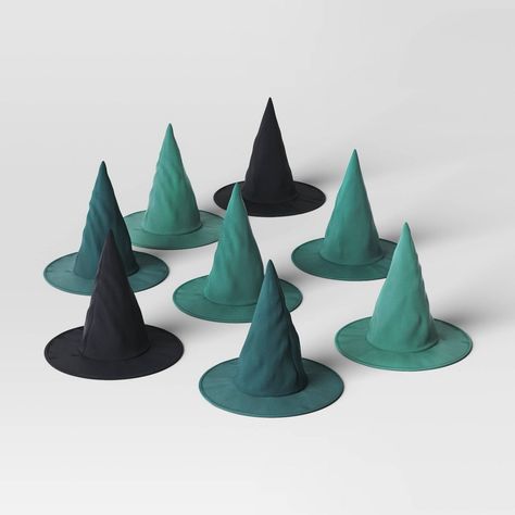 Add a bewitching look to your Halloween display with this 8-Count Witch Hats Halloween Decor Kit from Hyde & EEK! Boutique™. This Halloween decor kit is a collection of eight pointed witch hats made of fabric in different colors. Offering endless decorating possibilities, you can use these classic hats to cast a magical spell over your entire house - hang them from the ceiling with invisible string, place them on your mantelpiece or bookshelf, arrange them along your staircase, or use them as ce Pretty Halloween Decor, Witch Porch Decor, Colorful Halloween Decor, Halloween Office Decor, Boho Halloween Decor, Simple Halloween Decor, Harry Potter Christmas Decorations, Office Halloween Decorations, Hanging Fireplace