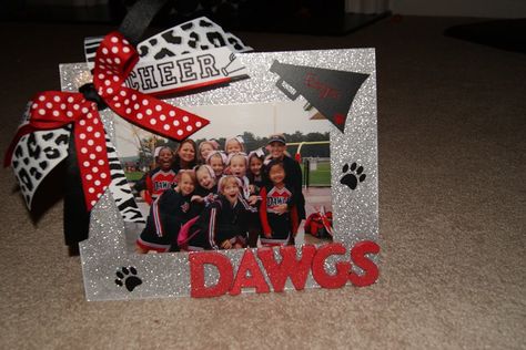 cheer picture frame for end-of-year gifts Cheer Award Display Ideas, Cheer Frames Diy, End Of Season Cheer Gifts For Team, Cheerleader Gifts End Of Year, Cheerleader Shadow Box Ideas, Cheer Bow Shadow Box Ideas, End Of Season Cheer Gifts, Cheer Coach Gifts End Of Year, Cheer Picture Frames Diy