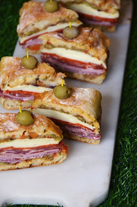 New Orleans Style Muffaletta Sandwich Bites - Always Order Dessert Mufelleta Sandwich Recipe, New Orleans Foods, Muffelata Sandwich Recipe, Sandwich Bites, Muffaletta Sandwich, Muffuletta Sandwich, New Orleans Style, Appetizer Sandwiches, Party Sandwiches