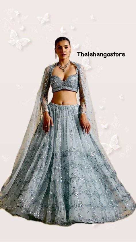 Contact us for any queries about product or shop and real images. Fabric : ⏭️ Net lehenga with sequins work  *3.25 meter flair* *CAN CAN attach* ⏭️ Net blouse with sequins work all over front & back ( unstitch ) ⏭️ Net duppata with sequins work  *Weight : 1.200 kg*