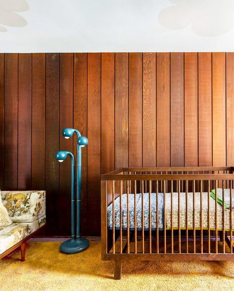 Exposed Brick Nursery, Wood Panel Nursery, Mid Century Modern Gender Neutral Nursery, Guest Room Nursery, Wood Pannel Ideas Nursery, 1970s Nursery, Cool Nursery Ideas, Midcentury Nursery, Nursery Gender Neutral