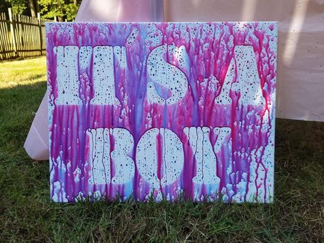 Gender reveal! My husband and I thought of this idea and it turned out amazing!  Used stencils, a cotton canvas (16x20 in the picture), painters tape, ScotchGard Heavy Duty Water Shield in an aerosol can, water based washable paint, water guns and some water to dilute the paint more. Gender Reveal Paint, Football Gender Reveal Invitations, Football Gender Reveal, Boy Or Girl Gender Reveal, Simple Gender Reveal, Creative Gender Reveals, Gender Reveal Baby Shower Themes, Baby Gender Reveal Party Decorations, Gender Reveal Unique