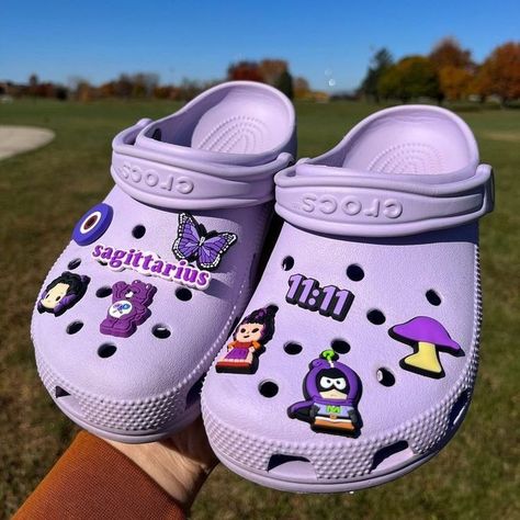 Follow for more 💜 Light Purple Crocs With Charms, Purple Crocs Aesthetic, Jibbitz Aesthetic, Crocs Charms Aesthetic, Croc Pins, Cool Crocs, Crocs Aesthetic, Crocs With Charms, Purple Crocs