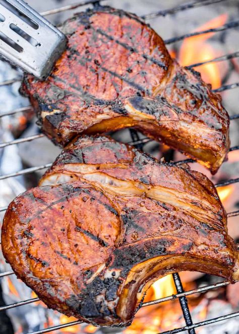 Favorite Grilled Pork Chops - the search is over. These are hands-down THE BEST pork chops!! SO easy and they taste amazing! Better than any restaurant! Pork chops marinated in worcestershire sauce, balsamic vinegar, soy sauce, olive oil, garlic, pepper and cayenne pepper. Let marinate overnight and grill for the BEST pork chops EVER. Such a quick and easy grilled pork recipe! #pork #grilled #glutenfree #lowcarb Best Pork Chops Ever, Pork Chop Marinade Recipes, The Best Pork Chops, Best Pork Chops, Pork Chop Marinade, Pork Chop Recipes Grilled, Marinated Pork Chops, Pork Marinade, Recipe Pork