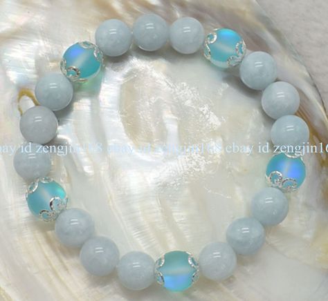 Natural 10mm Blue Aquamarine & Blue Moonstone Round Gemstone Beads Bracelet 7.5" Item Description: size(Approx): 10mm Quantity: 1 Pcs length: 7.5" Color: -- Clasp: -- &&&&: Sale the items does not include box. Payment Policy&Shipping Policy We accept PayPal Please pay within 24 hours If no payment or contact is made with in 7 days item will be relisted. Thank YouPlease make sure the "Ship To" address you input in Paypal is correct.Items are shipped within 1-2 business days.Combine shipping: Bidd Blue Moonstone Beaded Bracelets Gift, Blue Moonstone Beaded Bracelets With Gemstone Beads, Gift Blue Moonstone Beaded Bracelets, Blue Moonstone Bracelets For Healing, Blue Moonstone Bracelet For Healing, Spiritual Blue Moonstone Bracelets, Blue Gemstone Moonstone Bracelet, Blue Moonstone Gemstone Bracelet, Blue Crystal Bracelet With Round Natural Stones