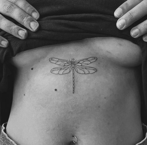 Dragonfly Tattoo On Hip, Butterfly Anatomy Tattoo, Dragonfly Tattoo Aesthetic, Sternum Dragonfly Tattoo, Dragonfly Tattoo Ribs, Dragonfly Sternum Tattoo, Dragonfly Patchwork Tattoo, Edgy Dragonfly Tattoo, Brown Tattoo Ink