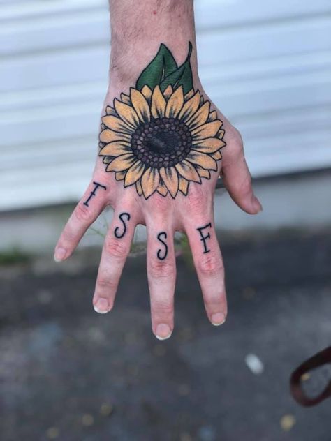 Sunflower hand tattoo https://www.facebook.com/21gunstattoo/ Hand Tattoos Sunflower, Sunflower On Hand Tattoo, Sunflower Tattoo On Hand, Hand Sunflower Tattoo, Sunflower Tattoo Hand, Sunflower Hand Tattoo, Traditional Sunflower Tattoo, Hand Tattoo Ideas, Ink Therapy