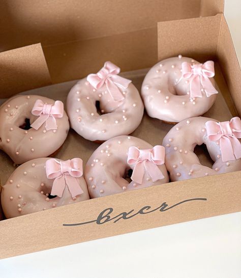 Custom order!!! 🎀 Did you know you can reach out to us with your custom order requests and we’ll do our best to make your vision come to life? These gorgeous donuts were made for a bridal shower and were the perfect touch of pink 🩷 Reach out to catering@boxcardonuts.ca for your custom order requests 💕 #boxcardonuts #bxcrdonuts #donutsofinstagram #bridalshower #sweettreat #explorepage Krispy Kreme Pink Donut, Donut Board, Pink Frosted Donut, Pink Sprinkle Donut, Coquette Birthday, Pink Doughnuts, Pink Donut, Birthday Donuts, Box Car