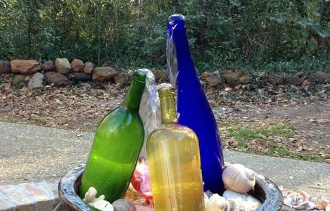 18 Interesting DIY Water Features To Make Inviting Yard Bottle Fountain Diy, Wine Bottle Fountain, Bottle Fountain, Fountain Diy, Fountains Indoor, Barrel Fountain, Diy Water Feature, Old Wine Bottles, Diy Water Fountain