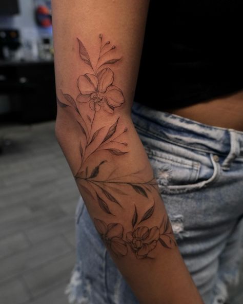 Leaf work and orchids vine wrap around Done @first_class_studios . . . . #fineline #leaf #floral #floralsdesign #orchids #forearmtattoo #tattooshop #tatt #tatted #blackwork #cordovaink #babydeviltattooco #philly #nyc #nj #hopatcong #aesthetic #trending #tatuajes #art #arte Wrap Tattoo, Anklet Tattoos, Forearm Tattoo, Tattoo Shop, Blackwork, Wrap Around, Tattoo Artists, Anklets, Tatting