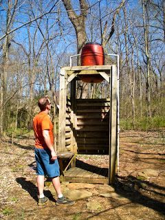 outdoor shower... collect rainwater, heat it with the sun. Rain Barrel Shower, Collect Rainwater, Greenhouse Design, Outdoor Shower Diy, Water From Air, Solar Shower, Seamless Gutters, Water Barrel, Outdoor Showers