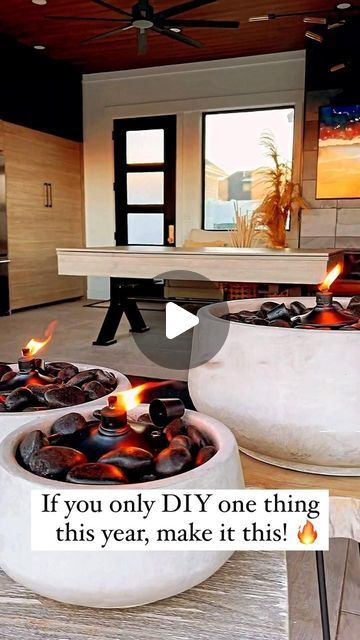 Brittany McDonald | Home Design on Instagram: "These DIY Fire Bowls are 🔥🔥🔥
Perfect for igniting the atmosphere on your deck, patio, porch, or poolside. Elevate your outdoor space in minutes with an irresistible ambiance and vibe. Obsessed with these weathered concrete bowls and the black river rocks are the perfect modern touch. Whether it’s a peaceful evening or a lively gathering, set the tone for unforgettable outdoor moments! ✨ 

Just fill the bowls with rocks, add a tiki torch and light. 
* I used some foam so the bowls were lighter. I would put cheap pea gravel or dirt on top, then the black river rocks, then the tiki torch. That way, there isn’t any risk of the foam being exposed to the flame.

🔥Comment “fire” if you want links

💫Follow for more easy DIY projects

#diyfirebowl Black River Rock, Weathered Concrete, Peaceful Evening, Concrete Bowl, Black River, Pea Gravel, River Rocks, Tiki Torches, Deck Patio