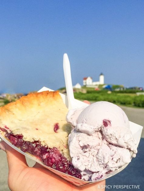 BLueberry Pie in Front of Nubble Lighthouse, Kittery, Maine (York) on ASpicyPerspective.com #travel Nubble Lighthouse, East Coast Vacation, Kittery Maine, Maine Road Trip, A Spicy Perspective, Travel Maine, Maine Trip, New England Trip, Acadia National Park Maine